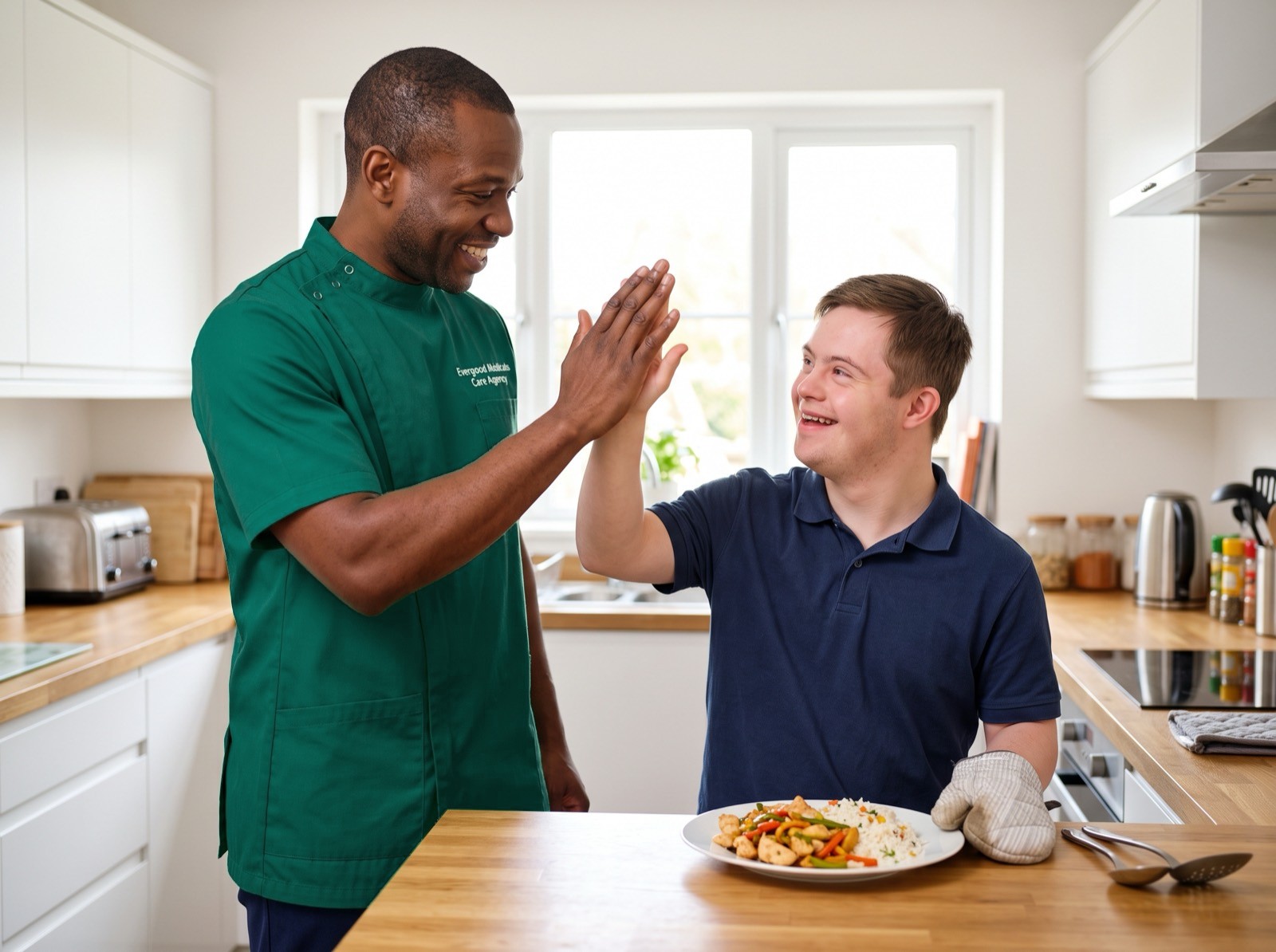 Evergood Medicals support worker celebrating an independent cooking achievement during learning disabilities support in Crawley