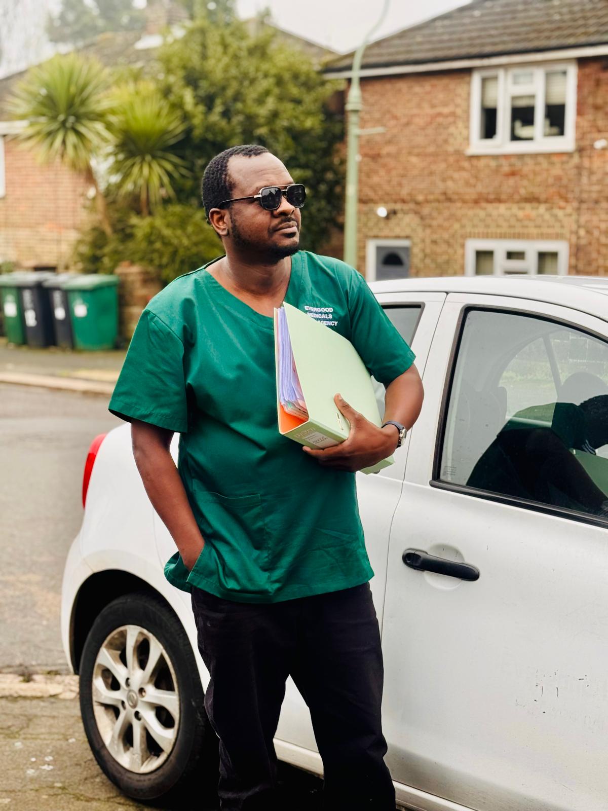 An Evergood Medicals carer with training paperwork, ongoing professional development