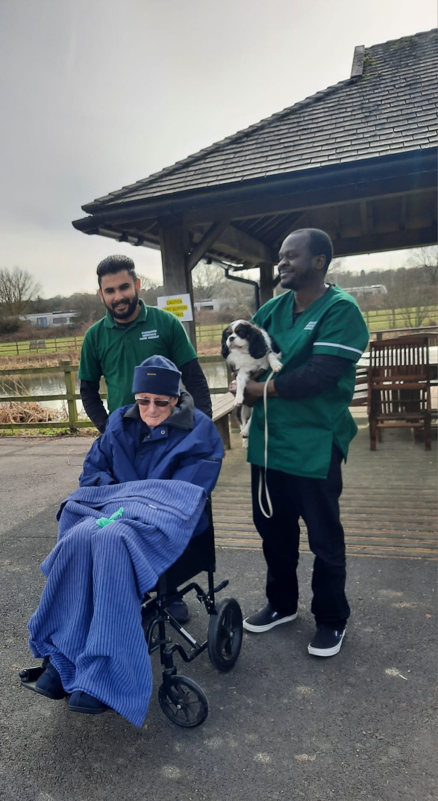 Evergood Medicals carers supporting a wheelchair user on a day out